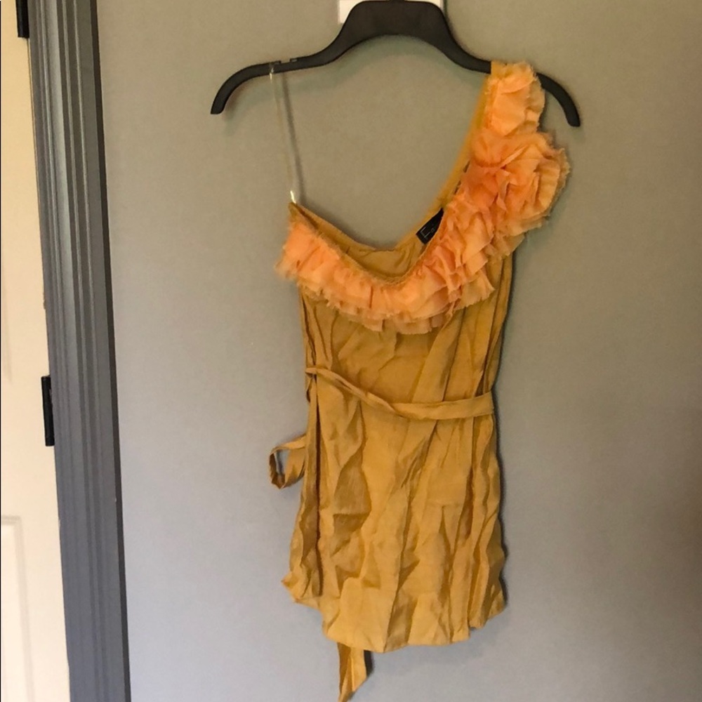 Gold one-shoulder top with flower & ruffle detail